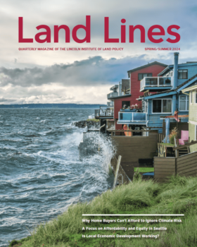 Land Lines magazine cover image showing houses along stormy waters in Seattle.
