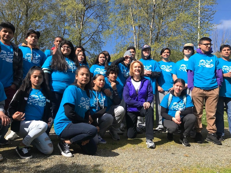 Group picture of Duwamish Valley Youth corps members and the mayor of Seattle.