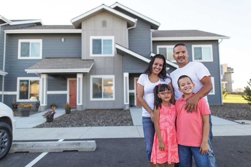 Pasco residents at an affordable courtyard apartment complex built for agricultural workers in 2015. New zoning policies will allow more developments like this to be built. Credit: Matt Banderas.