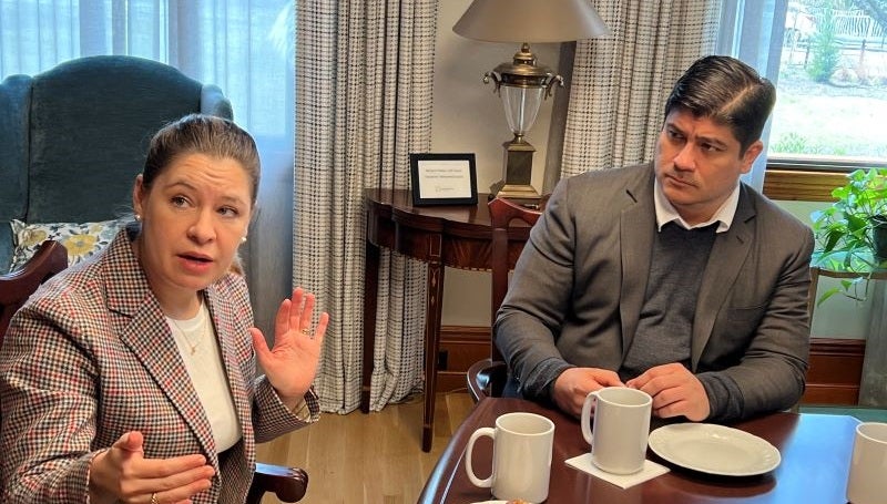 Former First Lady of Costa Rica Claudia Dobles Camargo makes a point as former President Carlos Alvarado Quesada looks on