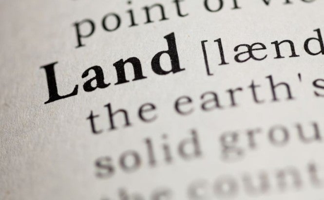 Partial definition of the word land on a dictionary page