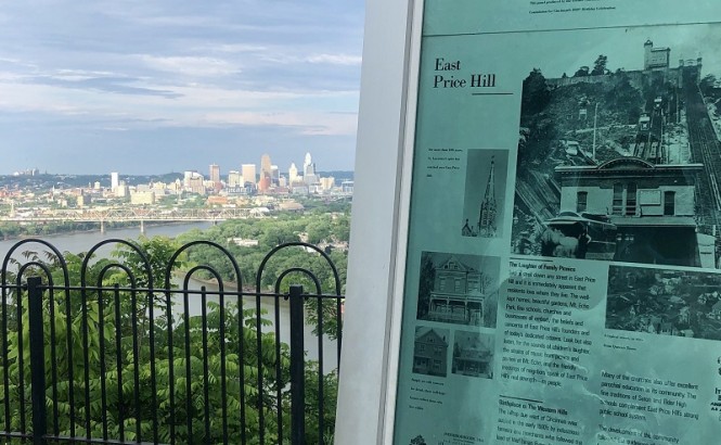 View of downtown Cincinnati from East Price Hill, with sign in foreground.