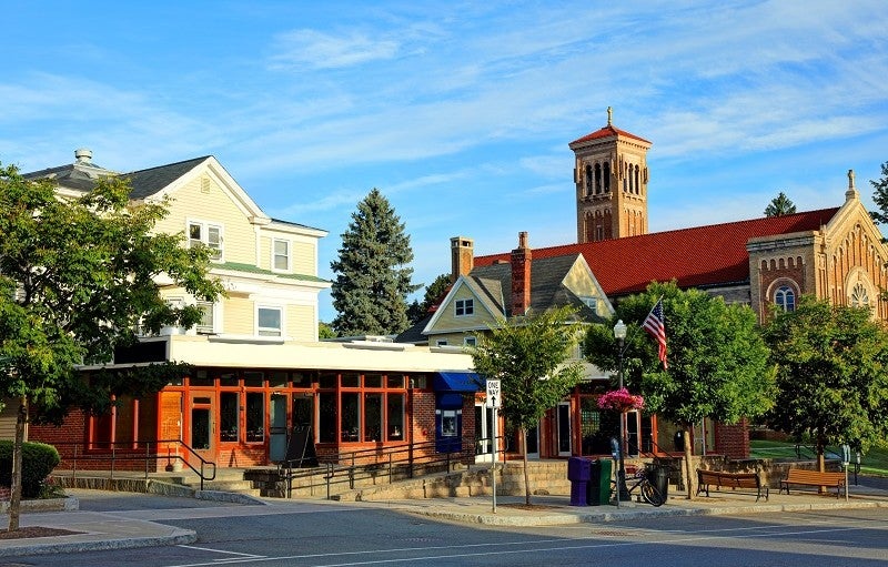 Credit: Denis Tangney Jr. via iStock/Getty Images Plus Buildings and blue sky in a New England town