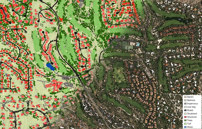 Image shows a high resolution satellite image of a residential area in Tucson, Arizona. Half of the image is overlaid with red to indicate buildings, black to indicate roads, blue to indicate water, and various greens to indicate land and vegetation. The other half of the map looks like a traditional satellite image that shows the landscape as a photograph from very high above.