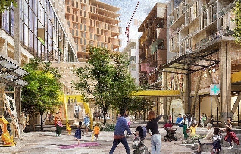 Renderizado de sendero peatonal interior en Quayside, un desarrollo de ciudad inteligente plani cado en la ribera de Toronto. Crédito: Picture Plane para Heatherwick Studio para Sidewalk Labs. Una representación muestra a familias y personas caminando y socializando en primer plano y edificios y construcción en el fondo.