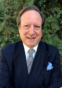 A headshot of Armando Carbonell